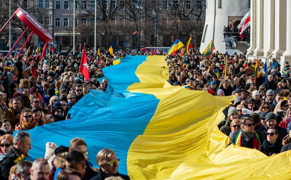 parade with large ukraine flag