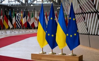 EU and Ukraine Flags on a Podium