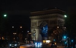 EU flag flying under the Arc de Triomphe