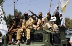 Taliban fighters celebrate the third anniversary of the withdrawal of US-led troops from Afghanistan, in Kabul, Afghanistan, Wednesday, Aug. 14, 2024. (AP Photo/Siddiqullah Alizai)