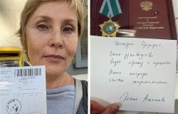 Zhanna Agalakova returns a medal to Vladimir Putin