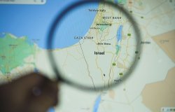 Map of Israel and Vicinity Showing Gaza Strip under a magnifying glass